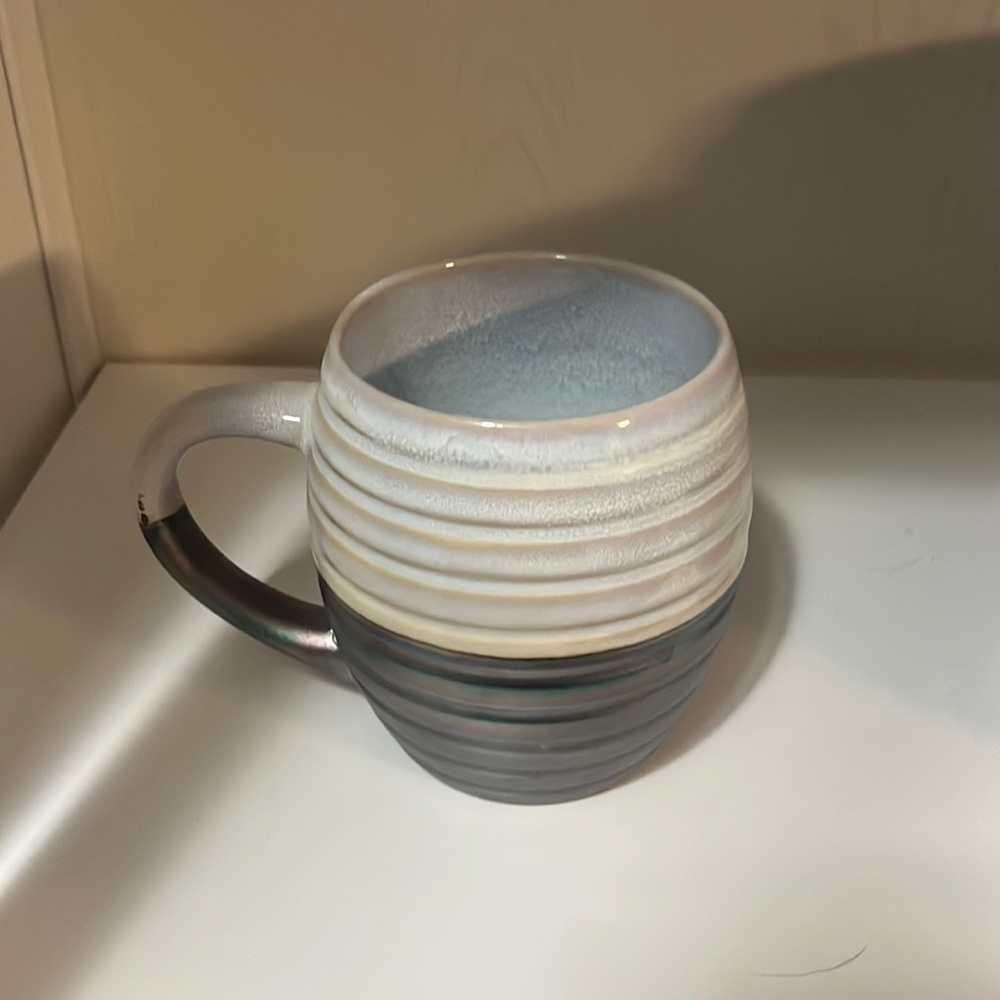 White and marble coffee cup. Used a handful of times